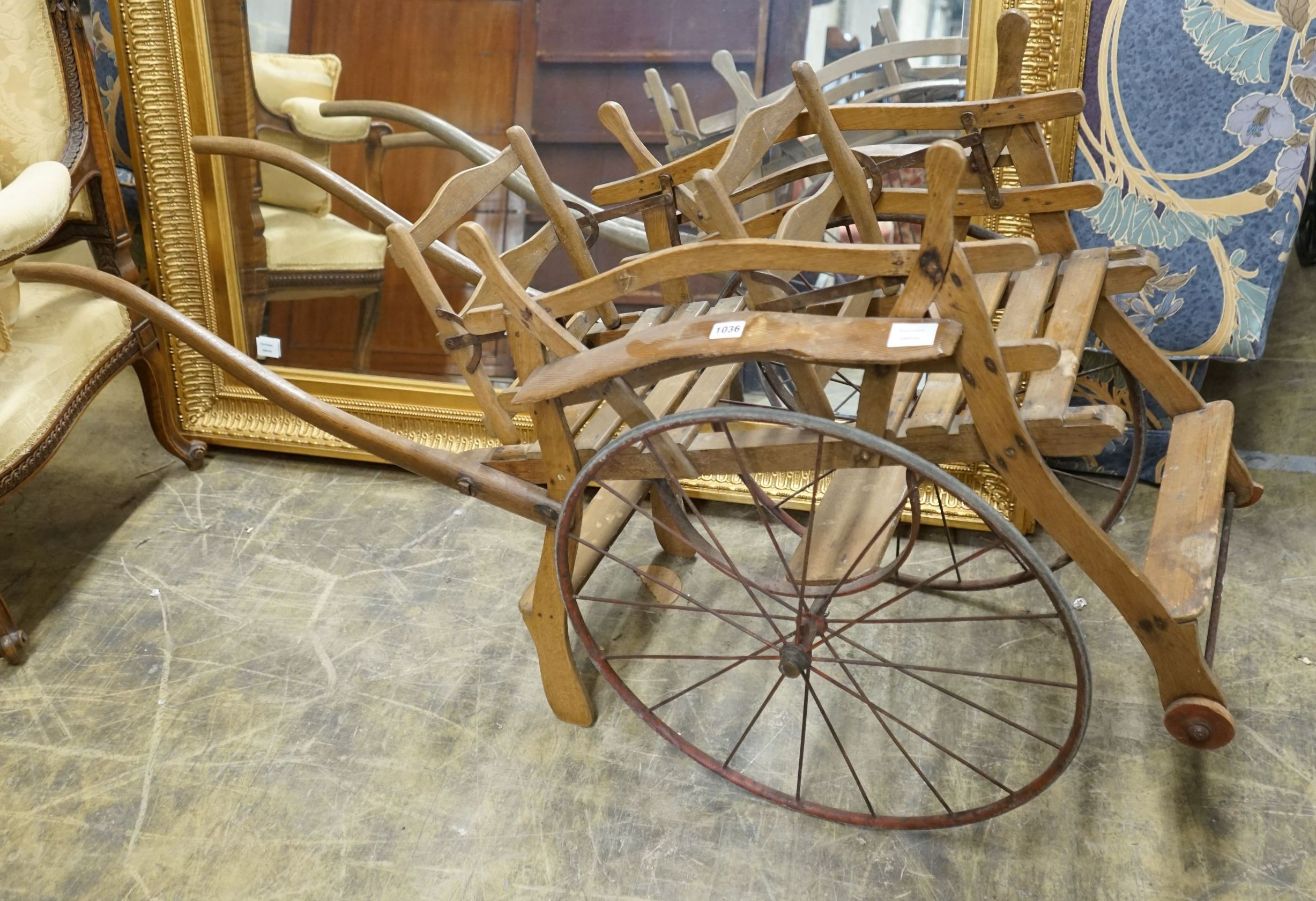 A small oak and pine twin seat cart, width 48cm, length 150cm